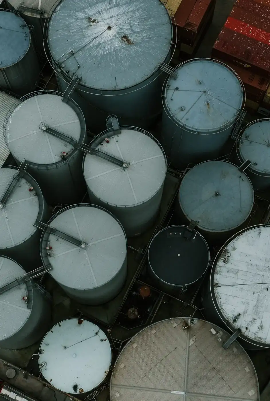 Sealed drums staged for fluid delivery